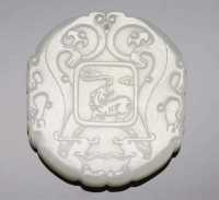 19th century A white jade circular pendant